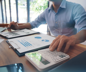 A businessman reviewing graphics.